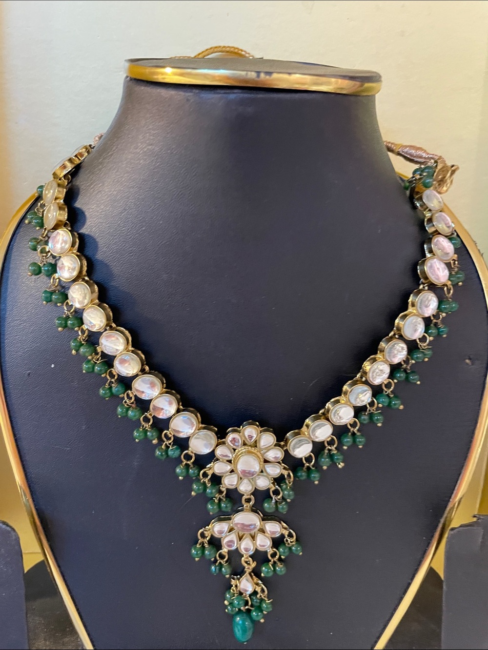 Gold-Tone Kundan Necklace with Green Bead Accents